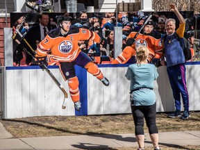 Graphic art along 102 Ave in Oliver features a life-like depiction of the Edmonton Oilers bench with Connor McDavid coming over the boards. It draws the attention of walkers and cyclists as they pass. on April 29, 2023.