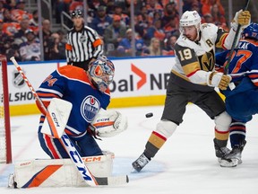 Goalie Stuart Skinner (74) of the Edmonton Oilers, makes a stop while Reilly Smith of the Las Vegas Golden Knights looks at the rebound at Rogers Place in Edmonton on May 8, 2023 Photo by Shaughn Butts-Postmedia