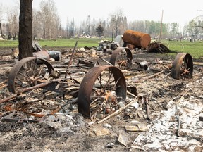 Damaged property from recent wildfires is shown in Drayton Valley on Wednesday, May 17, 2023. Air quality statements continue to blanket much of the Prairie provinces as scores of wildfires rage across the region.