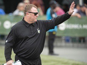 Edmonton Elks head coach and general manager Chris Jones calls the play against the Saskatchewan Roughriders in the 2023 Canadian Football League season-opener at Commonwealth Stadium on Sunday, June 11, 2023.
