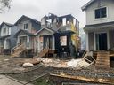Three homes under construction were damaged in house fire at 120 Avenue and 59 Street in the early morning on Wednesday, June 14, 2023, in Edmonton.