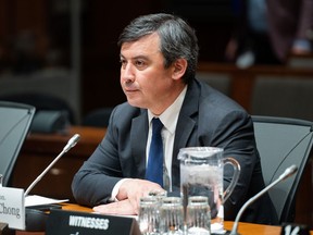 Conservative MP Michael Chong prepares to testify at the House of Commons procedure and house affairs committee on Tuesday, May 16, 2023.