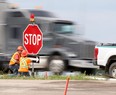 A stop sign is replaced at the scene of a serious crash at the intersection of highways #1 and #5, near the town of Carberry on Friday, June 16, 2023.