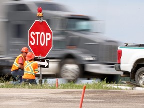 A stop sign is replaced at the scene of a serious crash at the intersection of highways #1 and #5, near the town of Carberry on Friday, June 16, 2023.