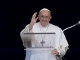 Pope Francis delivers his blessing as he recites the Angelus noon prayer from the window of his studio overlooking St.Peter's Square, at the Vatican, Sunday, June 18, 2023.