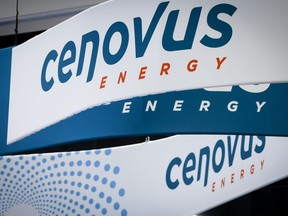 Cenovus Energy logos are on display at the Global Energy Show in Calgary, Alta., Tuesday, June 7, 2022.&ampnbsp;Cenovus Energy Inc. has been issued a clean-up order by the Alberta Energy Regulator after more than 1,000 litres of diesel spilled into a northern Alberta lake.