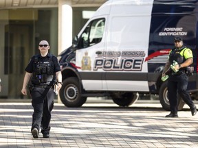 Members of the Waterloo Regional Police investigate a stabbing at the University of Waterloo, in Waterloo, Ont., Wednesday, June 28, 2023.