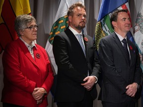 Northwest Territories Minister of Health and Social Services Julie Green, from left to right, Alberta Minister of Mental Health and Addiction Nicholas Milliken and Alberta Health Minister Jason Copping listen during a news conference with their provincial counterparts in Vancouver, on Tuesday, Nov. 8, 2022. The N.W.T government is lauding changes to its mental health care system that it says reduced wait times for counselling by 79 per cent between 2020 and 2022.