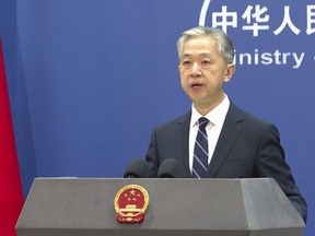 Chinese Foreign Ministry spokesperson Wang Wenbin speaks during a press conference at the Ministry of Foreign Affairs in Beijing, Friday, June 16, 2023.