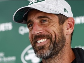 Quarterback Aaron Rodgers of the New York Jets talks to reporters after training camp at Atlantic Health Jets Training Center on July 26, 2023 in Florham Park, New Jersey.