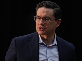 Conservative Leader Pierre Poilievre steps away from the microphone after an announcement and news conference, in New Westminster, B.C., on Tuesday, March 14, 2023.