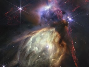 The first anniversary image released Wednesday, July 12, 2023, by Space Telescope Science Institute Office of Public Outreach, shows NASA’s James Webb Space Telescope displaying a star birth like it’s never been seen before, full of detailed, impressionistic texture.