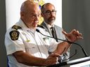 Chief Dale McFee, left, speaks to reporters at a July 31, 2023, news conference about a Statistics Canada report. McFee is facing criticism from the Edmonton Police Association, whose vice-president penned a column in an internal newsletter questioning his leadership.