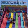People enjoy a ride on the Euroslide at K-Days on Tuesday, July 25, 2023, in Edmonton. 