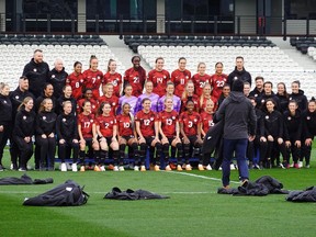 Canadian players and staff pose for a team photo prior to a training session ahead of the FIFA Women's World Cup in Melbourne, Australia, Thursday, July 20, 2023.