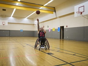 Ryan Straschnitzki, one of the Humboldt Bronco hockey players injured in the Humboldt bus crash, shoots hoops during a media event in Calgary, Alta., Thursday, July 27, 2023.