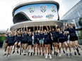 Young hockey players celebrate the launch of the Edmonton Female Hockey Alliance (EFHA) brand for girls hockey outside Rogers Place.