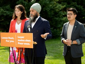 NDP Leader Jagmeet Singh speaks about the struggles renters face in Edmonton during a news conference with Edmonton Strathcona NDP MP Heather McPherson, left, and Edmonton Griesbach NDP MP Blake Desjarlais outside the North Glenora Community League, 13535 109A Ave., on Monday Aug. 14, 2023.