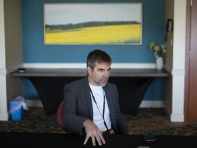 Environment Minister Steven Guilbeault says he is more convinced than ever of the need to regulate emissions in the oil and gas industry. Guilbeault is shown during an interview at the Liberal Cabinet retreat in Charlottetown, Tuesday, Aug. 22, 2023.