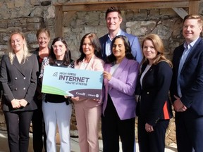 Some of the assorted federal and provincial politicians — including Treasury Board President Anita Anand — who gathered to announce $219 million in new spending on high-speed internet for rural Ontario.