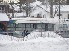 The court case of a Quebec man accused of killing two young children by driving a city bus into a Montreal-area daycare has once again been postponed. A city bus is shown next to a daycare centre in Laval, Que, Wednesday, Feb. 8, 2023, after it crashed into the building.