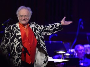 American-born conductor and composer Carl Davis thanks spectators during the Hollywood Night, the last concert of Prague Proms music festival in Prague, Czech Republic, on July 19, 2015. Carl Davis, the American composer and conductor behind the scores for numerous award-winning British television shows and movies, including 1973's 'The World at War,' a hugely influential documentary series about World War II, has died. He was 86.