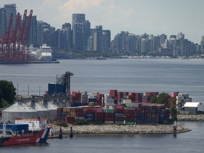 Stacks of cargo containers are seen at the Port of Vancouver.