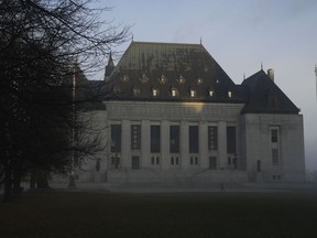 The Supreme Court of Canada is shrouded in fog in Ottawa, on Friday, Nov 4, 2022. The Supreme Court of Canada has refused to hear an appeal from three British Columbia churches who argued their constitutional rights were violated when provincial restrictions banned indoor religious services during the COVID-19 pandemic.THE CANADIAN PRESS/Sean Kilpatrick