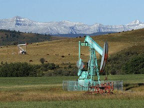 FILE PHOTO: Oilfield pumpjacks, belonging to Crescent Point Energy, work producing crude near Longview, Alberta on Sept. 10, 2020.