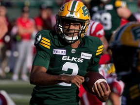 The Edmonton Elks' quarterback Tre Ford (2) runs the ball against the Calgary Stampeders during first half CFL action at Commonwealth Stadium, in Edmonton Saturday Sept. 9, 2023. Photo by David Bloom