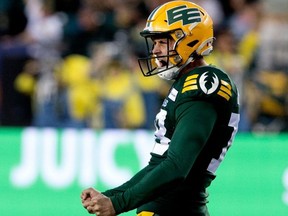 Edmonton Elks' place kicker Dean Faithfull yells in celebration, fists clenched in front of him