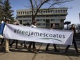 Supporters rally outside court as pastor James Coates, of GraceLife Church, is in court to appeal the bail conditions, after he was arrested for holding day services in violation of COVID-19 rules in Edmonton, Alta., on Thursday March 4, 2021. Pandemic-era public health charges have been dropped against the Edmonton-area pastor and church, as well as a central Alberta man who hosted a rodeo in protest of COVID-19 restrictions.