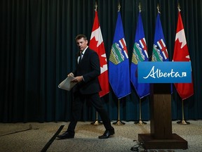 Alberta Finance Minister Nate Horner leaves a provincial fiscal update press conference at McDougall Centre in Calgary on Thursday, Aug. 31.