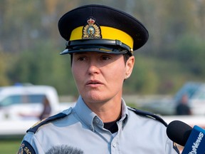 Sgt. Maj. Leilani Collins speaks to the media