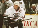 Former Oilers captain Doug Weight skates during a game.