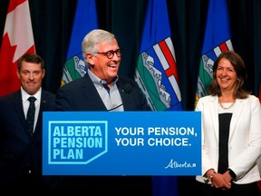 Danielle Smith, Premier, Nate Horner, President of Treasury Board and Minister of Finance and Jim Dinning, chair, Alberta Pension Plan Report Engagement Panel release an independent report on a potential Alberta pension plan in Calgary on Sept. 21, 2023.