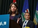 Premier Danielle Smith answers media questions as Dr. Mark Joffe, chief medical officer of health, listens in the background at McDougall Centre during the latest update on the investigation into the E. coli outbreak in Calgary at  on Wednesday, September 27, 2023. 
Gavin Young/Postmedia