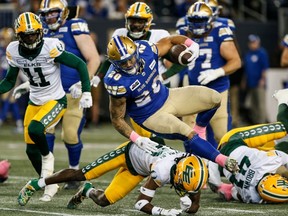 Winnipeg Blue Bombers' Brady Oliveira (20) runs for the first down against the Edmonton Elks during first half CFL action in Winnipeg, Saturday, Oct. 21, 2023.