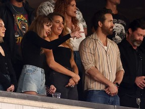 From left: Singer Taylor Swift and actor Ryan Reynolds look on prior to the game between the Kansas City Chiefs and the New York Jets at MetLife Stadium on Oct. 1, 2023 in East Rutherford, New Jersey.