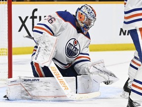 Edmonton Oilers goaltender Jack Campbell (36) gloves a Nashville Predators shot during the second period of an NHL hockey game on Tuesday, Oct. 17, 2023, in Nashville, Tenn.