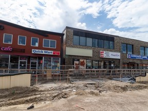 Businesses along Stony Plain Road have seen a drop in revenue while construction of the West LRT line continues, closing two lanes of traffic and resulting in the loss of sidewalks.