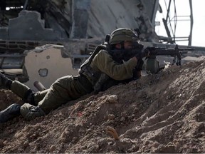 An Israeli soldier taking position inside the Gaza Strip, Nov. 11.
