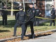 Windsor police officers are shown at a townhouse in the 1400 block of Southdale Drive on Tuesday, November 14, 2023. A 62-year-old Windsor man has been charged with first-degree murder in connection with the death of his wife.