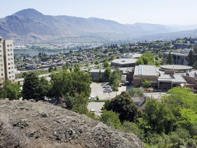The city of Kamloops and the Thompson River University campus are seen in Kamloops, B.C., Friday, June 2, 2023. One member of the Thompson Rivers University men's volleyball team is dead and two more are in critical condition following a car crash Wednesday in Kamloops.THE CANADIAN PRESS/Jeff McIntosh