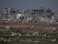 Destroyed farms and buildings in the Gaza Strip as seen from Southern Israel, Friday, Dec. 22, 2023.