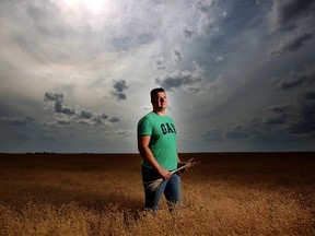 Sean Stanford poses for a photo in his field of flax on his farm near Margate, Alberta on Tuesday, September 11, 2018.