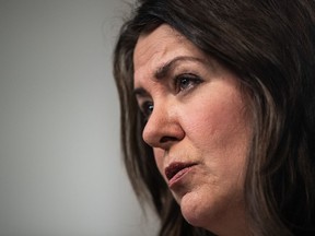 Alberta Premier Danielle Smith speaks in Edmonton on Monday, Nov. 27, 2023. Premier Danielle Smith is denying it was her decision to quash the hiring of Alberta's former chief medical officer to a new job at the province's health agency.
