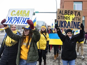 The Liberal Party of Canada has launched attack ads targeting 18 Prairie ridings that have a large Ukrainian diaspora community and are held by Conservative MPs, as Liberals accuse their political rivals of turning their backs on Ukraine. People take part in a rally in support of Ukraine and against the Russian invasion, in Edmonton on Sunday, Feb. 27, 2022.