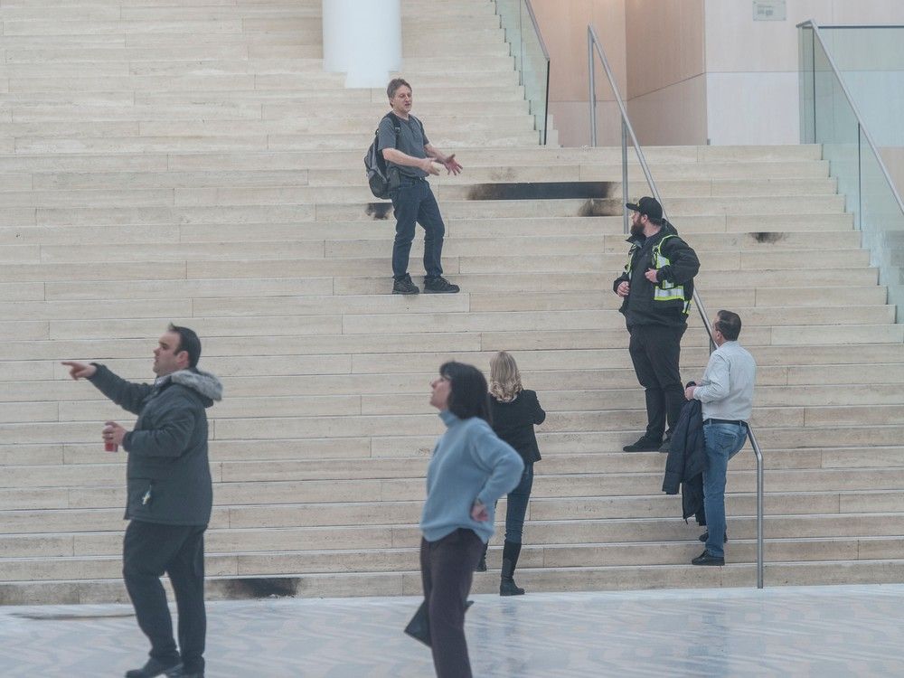 Damage from small fires can be seen in the city room of Edmonton city hall on Wednesday, Jan. 24, 2024, one day after a man was arrested with Molotov cocktails and at least one firearm. 