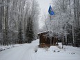 Alberta's flag flies from a checkpoint on the access road to Gregoire Lake Provincial Park on Saturday January 9, 2016.